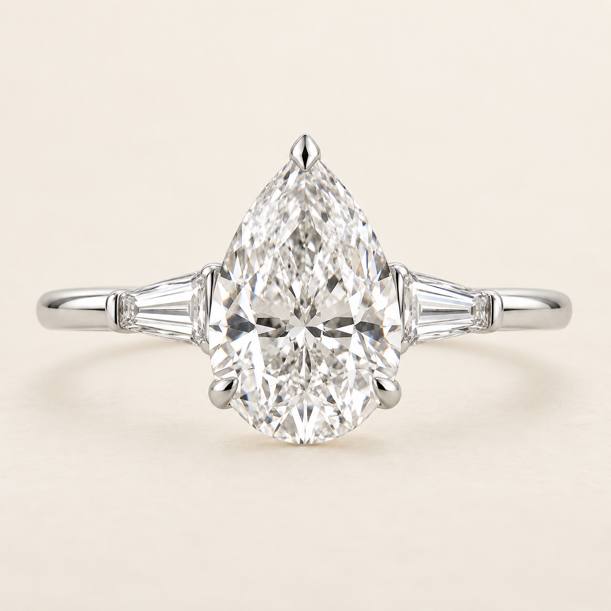 The Orlienne — 2.10ct Pear Three-Stone front view
